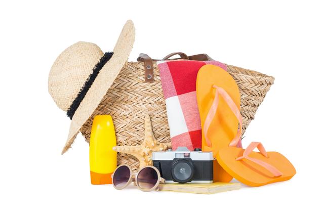 Various beach accessories isolated on white background