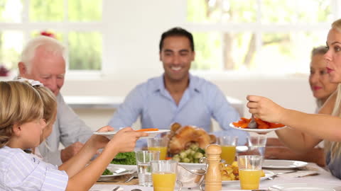 Family Enjoying Traditional Dinner Gathering at Home