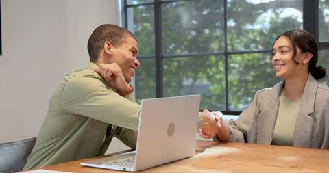 Optimistic Job Interview with Multiracial Professionals in Modern Office