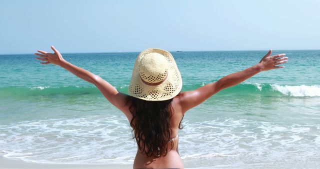 Woman Enjoying Freedom at Tropical Beach - Download Free Stock Images Pikwizard.com