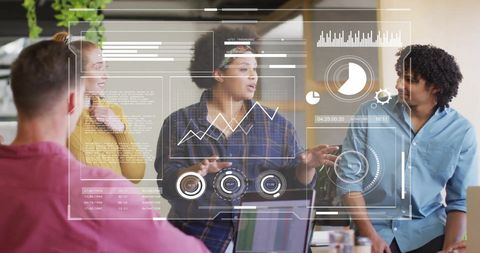 Diverse Team Discussing Data and Analytics in Modern Office