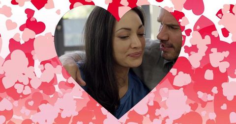 Romantic Couple Sharing Intimate Moment in Heart Frame