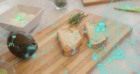 Rustic bread and avocado on cutting board with teal augmented reality network overlay