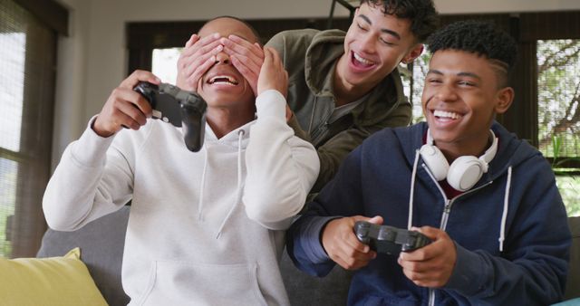 Teenage Friends Having Fun Playing Video Games Together - Download Free Stock Images Pikwizard.com