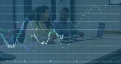 Business Professionals Analyzing Financial Growth Data on Laptop