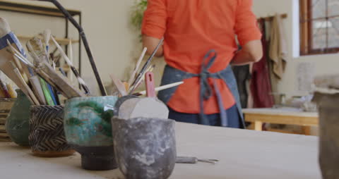 Potter Working in Creative Pottery Studio