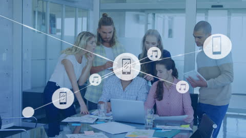 Diverse Team Exploring Digital Connectivity in Modern Office