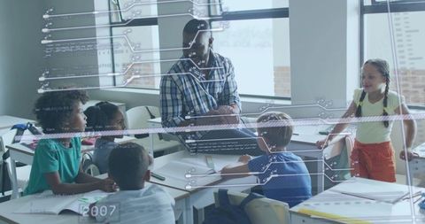 Teacher holding textured ball leading interactive stem lesson with students and digital ui