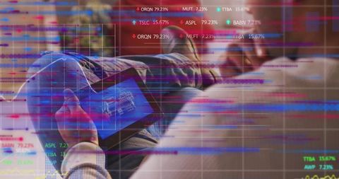 Digital Blueprint Review on Tablet in Contemporary Living Room