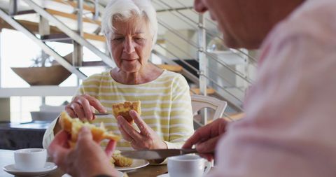 Senior Couple Sharing Breakfast at Home