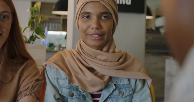 Young Muslim Woman Wearing Hijab Smiling in Casual Setting - Download Free Stock Images Pikwizard.com