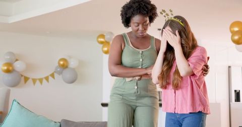 Comforting Friend During Birthday Party Celebration