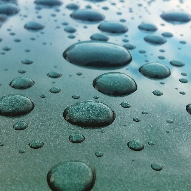 Macro Shot of Raindrops on Metallic Surface - Download Free Stock Photos Pikwizard.com