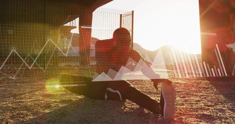 Stretching male athlete under sunlit bridge with data chart overlay
