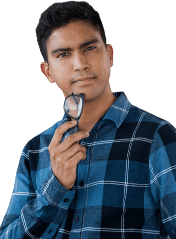 Pensive young man holding eyeglasses in transparent background