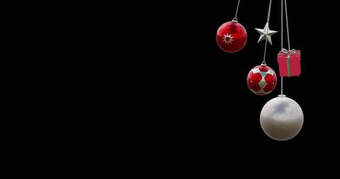 Christmas Baubles Hanging on Black Background Celebration Theme