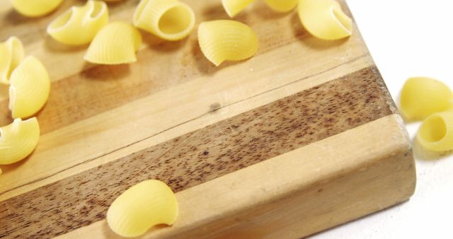 Pasta Shells on Wooden Cutting Board - Download Free Stock Images Pikwizard.com