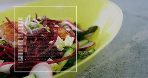 Serving vibrant beet and shrimp salad in lime bowl with radish, feta and digital overlay