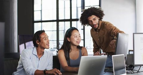 Diverse team collaborating on workplace projects