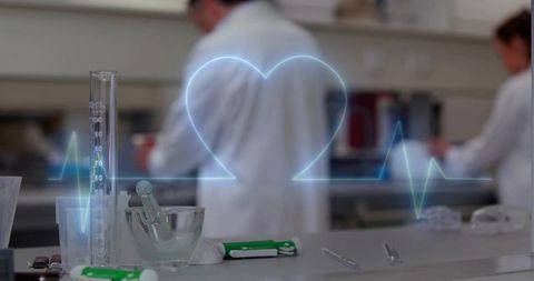 Glowing ecg heartbeat overlaying laboratory bench with glassware, scientists collaborating