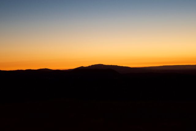 Stunning Mountain Silhouette At Sunset With Golden Sky - Download Free Stock Photos Pikwizard.com