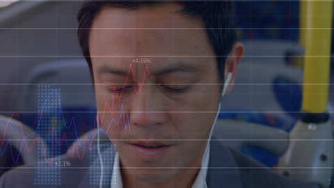 Man Analyzing Data with Digital Interface on Public Transport