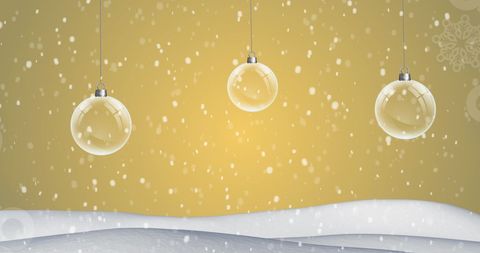 Hanging Christmas Baubles in Winter Wonderland Scene