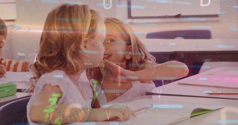 Girls whispering in classroom sharing secrets and friendship