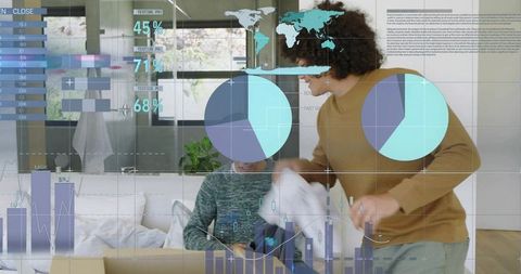 Young duo organizing clothing with augmented reality data overlays in modern apartment