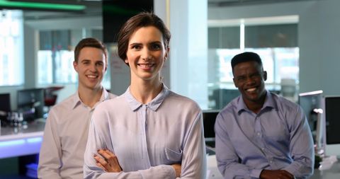 Diverse Team in Modern Office Showing Professional Confidence