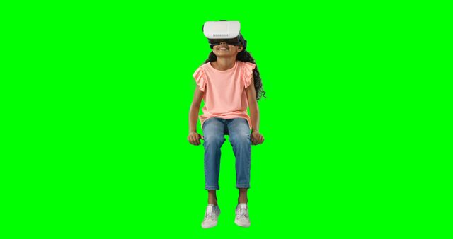 Child enjoying immersive virtual reality experience. Can be used in technology-focused presentations, gaming advertisements, educational materials, and futuristic concept designs.