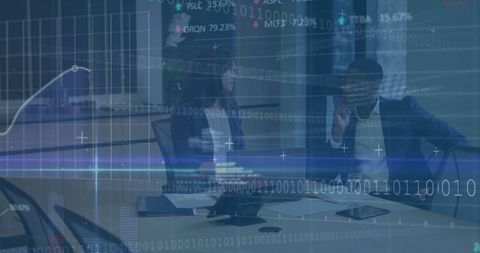 Multiracial business colleagues discuss financial technology in office