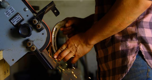 Person Grinding Metal in Workshop Creating Sparks - Download Free Stock Images Pikwizard.com