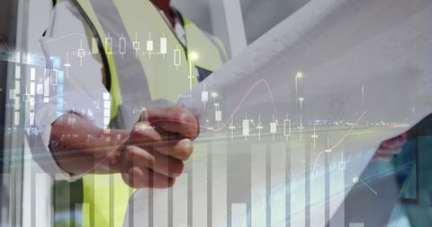 Architect Analyzing Blueprints with Financial Data Overlay - Download Free Stock Images Pikwizard.com