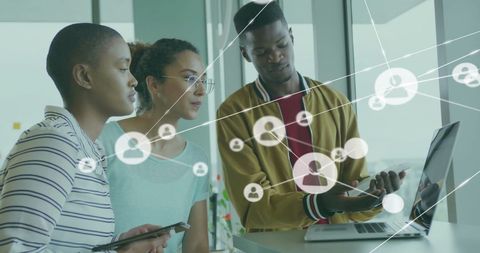 Diverse Professionals Analyzing Digital Network Partners Interface