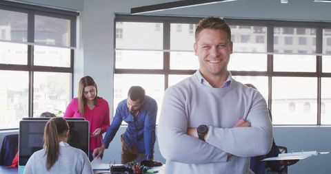 Confident Business Professional Leading Team with Digital Resources