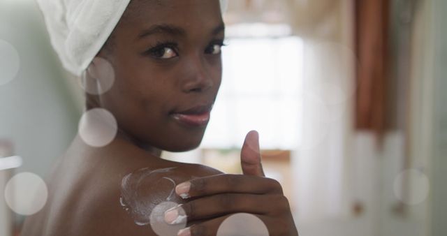 African American Woman Applying Skincare Cream over Light Spots - Download Free Stock Images Pikwizard.com