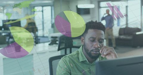 Focused business analyst reviewing financial data