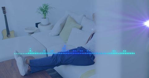man relaxing on sofa with music data visualizer overlay - Download Free Stock Images Pikwizard.com