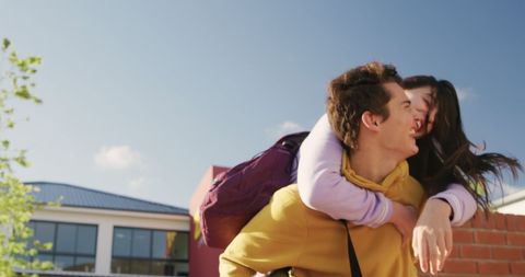 Joyful Teenage Couple Enjoying Outdoor Daytime