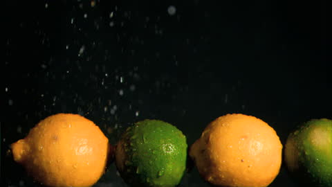 Refreshing Lemons and Limes in Slow Motion with Dramatic Water Effect
