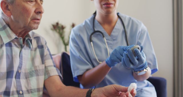 Nurse Performing Medical Test on Senior Man at Home - Download Free Stock Images Pikwizard.com