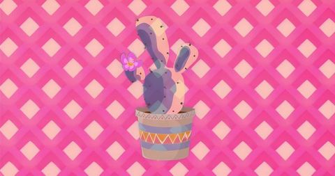 Purple cactus sitting in decorative pot on vibrant pink lattice background