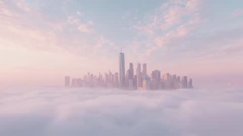 Misty Sunrise over City Skyline with Tower Emerging from Fog
