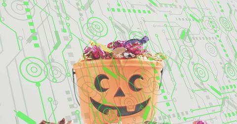 Halloween candy bucket with neon circuit overlay blending tech and festive colors