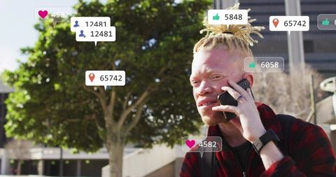 Urban influencer talking on smartphone with notification bubbles over city plaza skyline