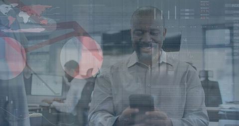 Smiling Businessman Holding Smartphone Interacting with Data Analytics Overlays in Office