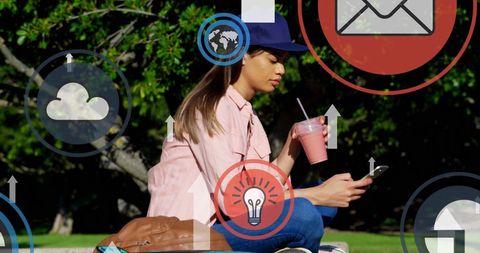 Young Woman Exploring Digital Connectivity Outdoors