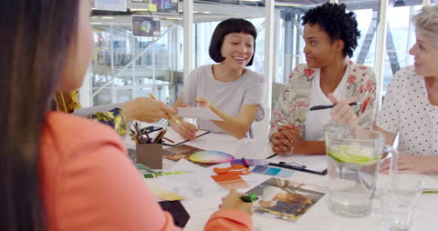 Diverse Creative Team Collaborating in Modern Meeting