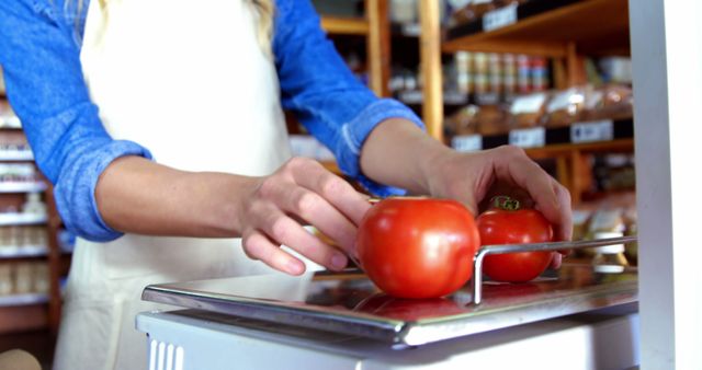 Busy grocery store with shop assistant weighing fresh tomatoes on scales. Ideal for illustrating retail environments, fresh produce, customer service settings in stores, food quality control in supermarkets, or marketing materials for grocery stores.
